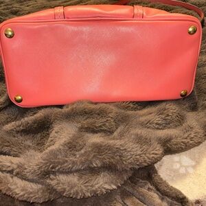 Coral COACH handbag/purse.